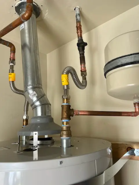 Water heater installation and plumbing repair in Country Club Village